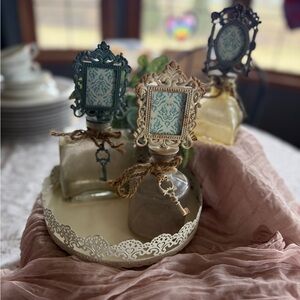 Set of 3 Vintage Cottagecore Glass Bottles w Ornate Frame & Key Charm Decor